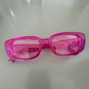 Pink plastic sunglasses